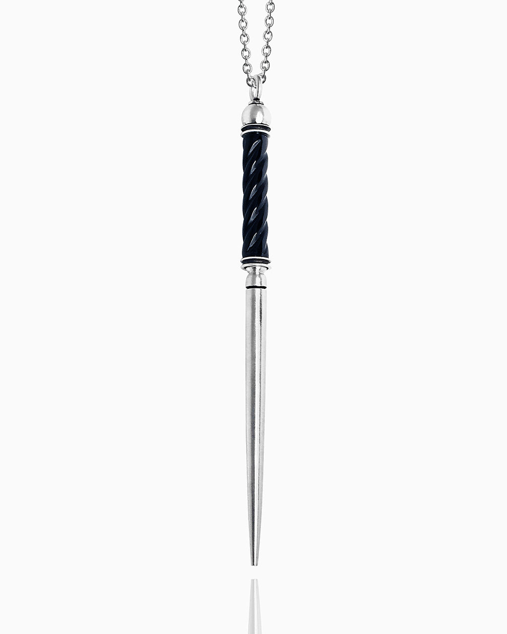 A sterling silver wand necklace hanging against a white background. The handle of the wand is made from a polished piece of black onyx with a spiraled line carved down the onyx bead, giving it a fluted appearance. A sterling silver ball sits on top, and the bottom of the wand is a smooth, tapered circle shape.